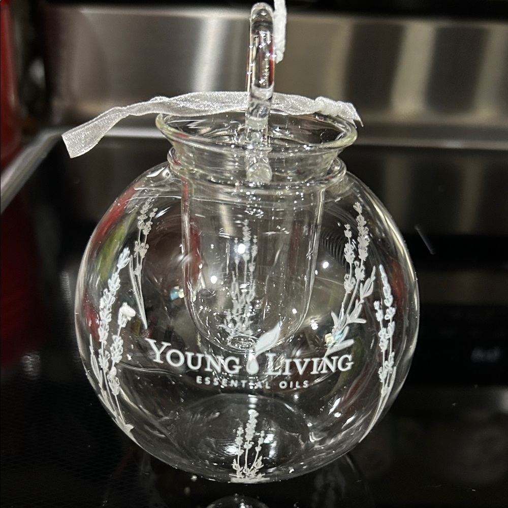 Young Living Clear Glass Ornament with White Floral Design